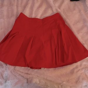 Bright red skirt, non stretchy waist band, size medium